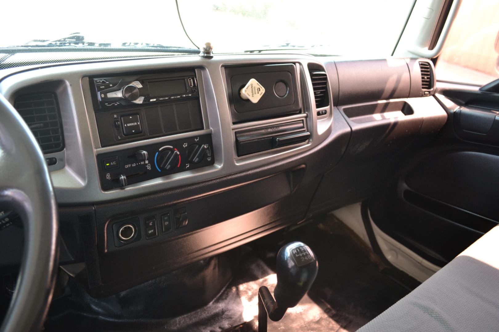 2012 WHITE HINO 338 with an HINO J08E-VB 8L 260HP engine, 6SPD MANUAL transmission, located at 9172 North Fwy, Houston, TX, 77037, (713) 910-6868, 29.887470, -95.411903 - 24FT FLATBED, 33,000LB GVWR ,98" WIDE , TOOL BOX, 90 GALLON FUEL TANK, SPRING RIDE, COLD A/C , CRUISE CONTROL, POWER WINDOWS & LOCKS - Photo#13
